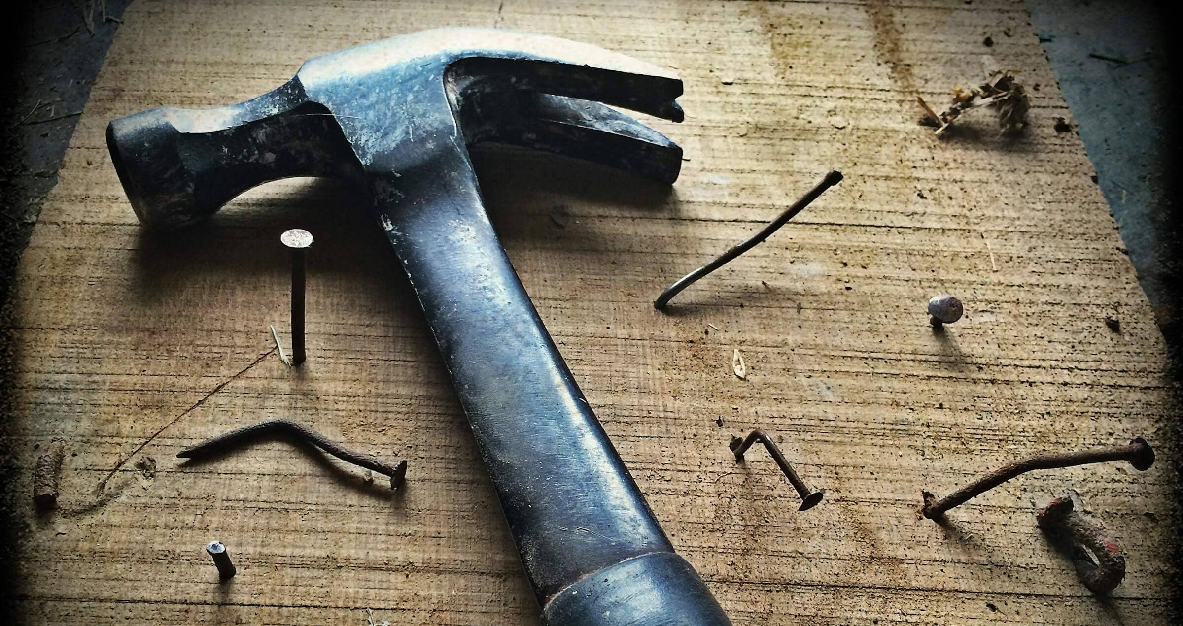 Image of hammer and crooked nails